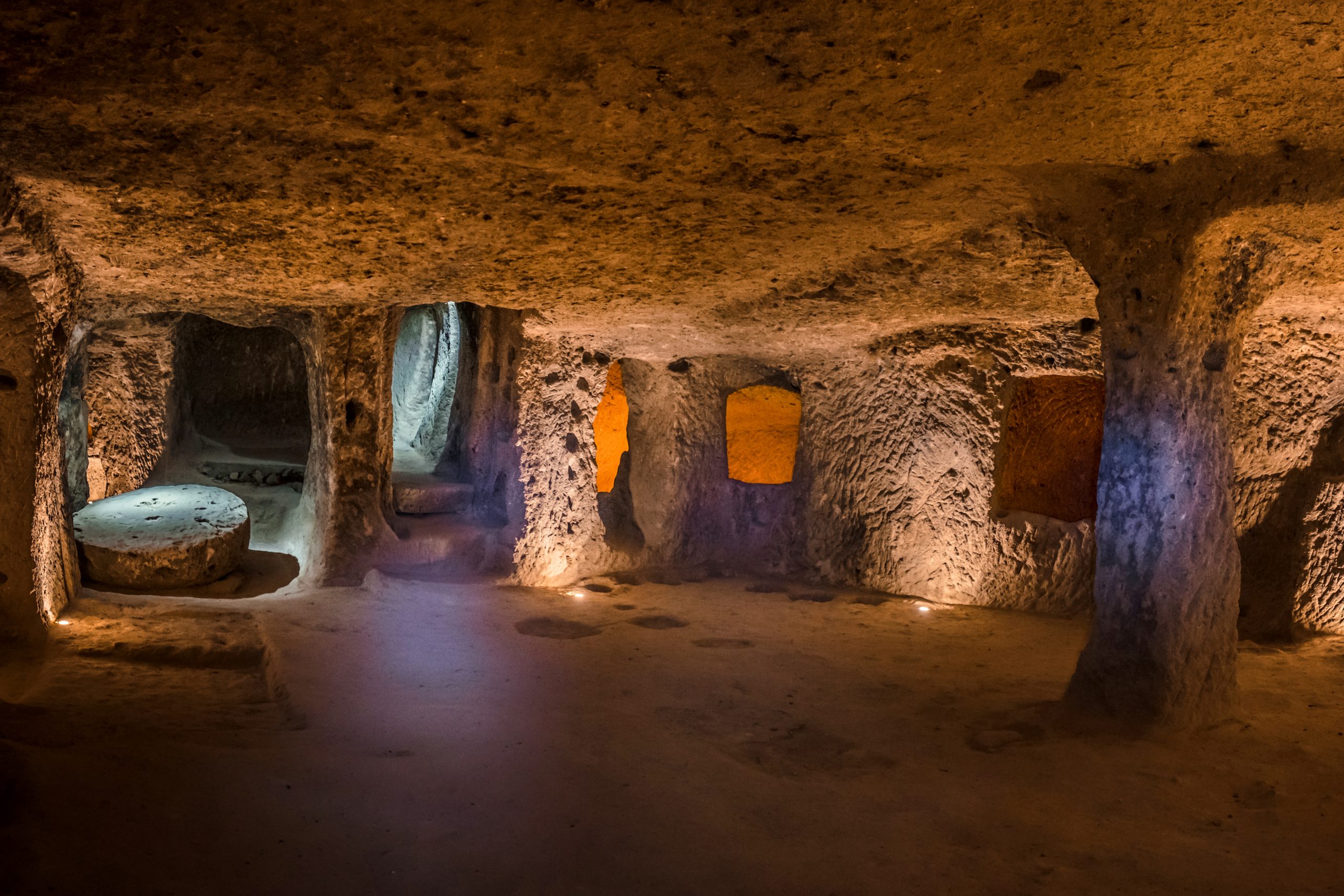 One of the rooms of the intricately carved undergrounds city of Derinkuyu. Depositphotos.